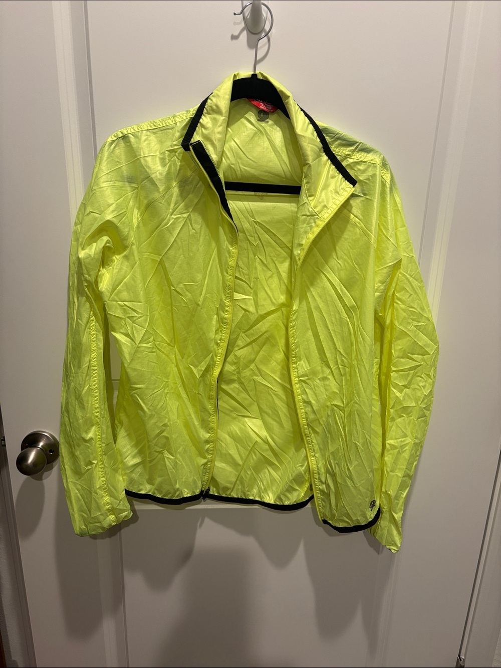 Pearl Izumi Women’s Neon Yellow High-Visibility Windbreaker Jacket